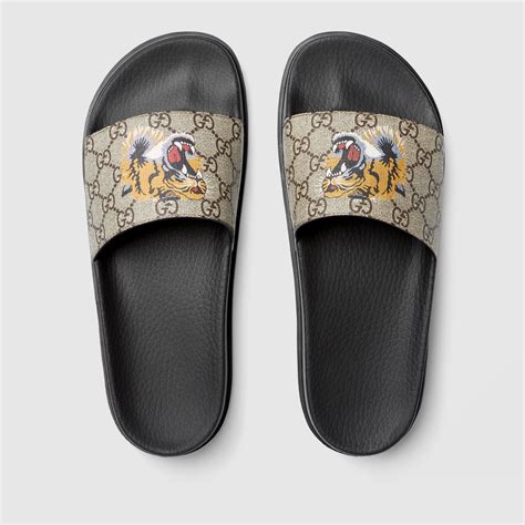 gucci mens rubber flip flops|men's Gucci tiger slides.